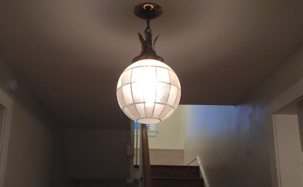 The art deco style pendant lamp that Deirdre preserved while redoing the house's lighting