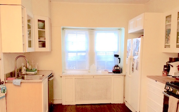 The kitchen before (top), and after (bottom), featuring new cabinets from the company Deirdre works for, new flooring, and appliances