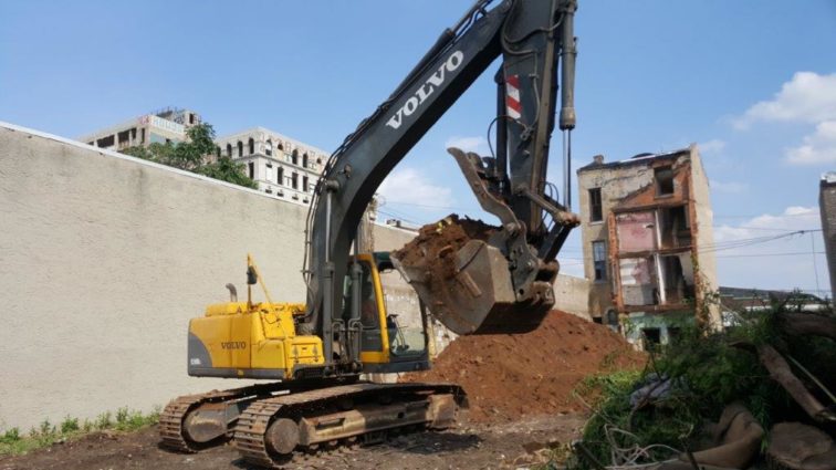 View from inside the construction site, and the front half of the Victorian rowhouse which will be repurposed