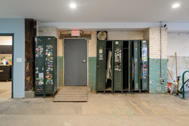 Exposed Brick with Paint and Lockers in Renovated Philadelphia warehouse 