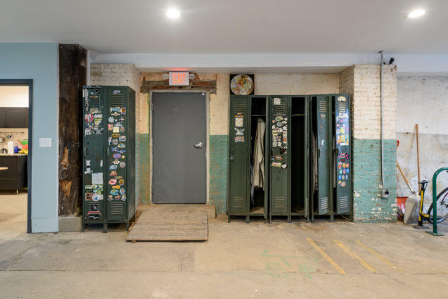 Exposed Brick with Paint and Lockers in Renovated Philadelphia warehouse