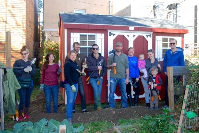 East Passyunk Community Garden members gather in the garden. 