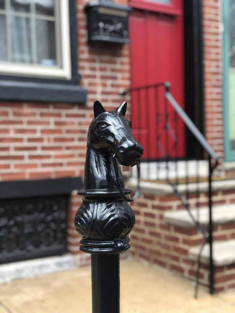 Close-up of horse-hitching post. Image: GoNomad